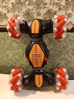 RC Stunt Car Gesture Sensing 4WD Double Sided Flip Red NO REMOTE Parts Only - Image 1 of 4