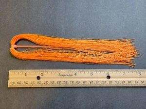 Patas de insecto Hank tamaño mediano redondas de goma NARANJA para atar moscas y AGUA SALADA - Imagen 1 de 2