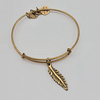 Brazalete Brazalete Alex and Ani Pluma Dije en Acabado Oro Rafaeliano Foto 1 de 4