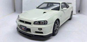 AUTOART 77406 NISSAN SKYLINE GT-R (R34) V SPEC II 2000 WHITE PEARL 1:18 - Picture 1 of 13