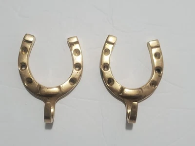 一对马蹄形钩挂外套、帽子或钥匙。 — 第 1/4 张图片