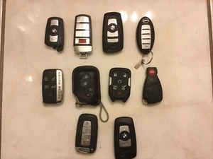 LOTS OF MIXED KEYLESS REMOTE CONTROL ONLY FOR PARTS - RANGE ROVER - NISSAN - ETC - Picture 1 of 12
