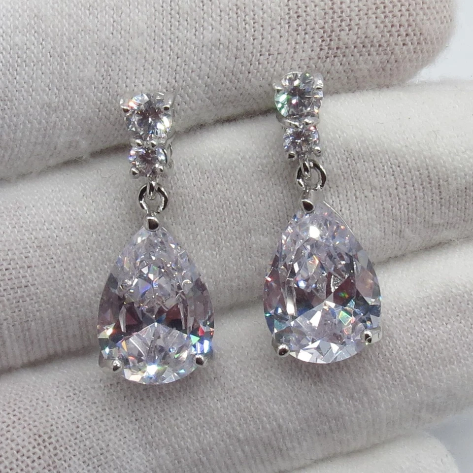 Pendientes colgantes lágrima circonita cúbica tono lavanda hermoso color suave Foto 1 de 4