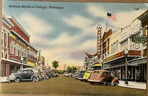 Letreros de tienda de autos antiguos escena callejera Gulfport Mississippi postal vintage c1930 - Imagen 1 de 6
