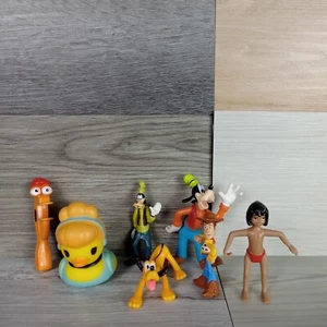 Disney PVC Figuren 7 Stück Dschungelbuch, Woody, Goofy, Pluto, Frozen + - Bild 1 von 3