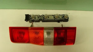 ORIGINAL FORD TRANSIT REAR LAMP ASSY WITH BULB HOLDER LEFT SIDE 2000 TO 2006 - Picture 1 of 4