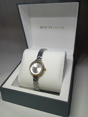 Reloj de cuarzo Bering de acero inoxidable de dos tonos de cristal facetado para dama Foto 1 de 4
