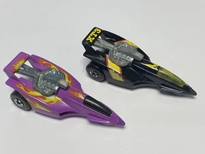 2x Vintage 1984 Hot Wheels XT-3 Fahrzeug schwarz und lila - Bild 1 von 3