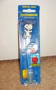 New Happee Care Peanuts 50th Anniversary Snoopy Dancing Soft Toothbrush with Cap - Picture 1 of 2