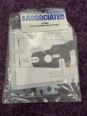 B6)Vintage RC Car Team Associated 7494 V2 Stamped Multi-Tool Shocks Turnbuckles - Image 1 of 3