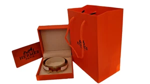 HERMES ARMBAND CLIC H, NEU, WEISS / GOLD, OVP MIT KARTON + KAUFBELEG 2025, 660 E - Bild 1 von 9