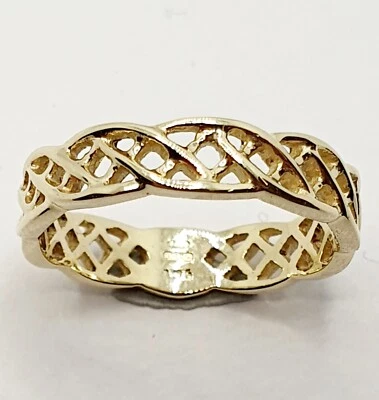 Elegante anillo celta de oro amarillo con banda torcida de eternidad completa de 9 quilates con sello Foto 1 de 4