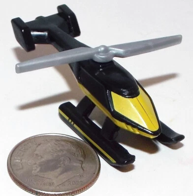 Small Hasbro 2020 Micro Machine Plastic Helicopter in Black and Yellow - Image 1 of 3