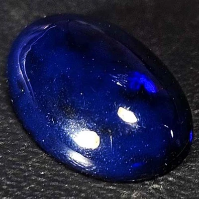 NATURAL AAA+ULTRABLUE COLORPLAY OVAL CABOCHAN  ETHIOPIAN WELO BLACK OPAL 1.10CTS - Image 1 of 3
