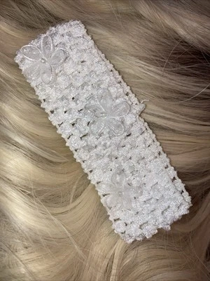 Diadema elástica con flores blancas  Foto 1 de 3