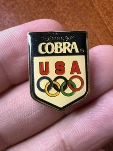 Vintage King Cobra Bier Sponsor Anstecknadel USA Olympia goldfarben #3B - Bild 1 von 3