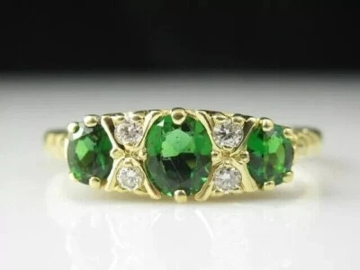 Anillo de boda de tres piedras con esmeralda simulada de corte ovalado de 2 quilates enchapado en oro amarillo de 14 k Foto 1 de 4