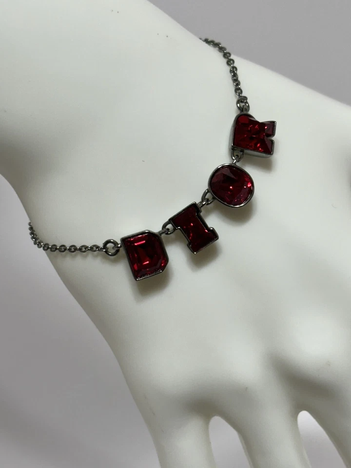 PULSERA DE COLECCIÓN CHRISTIAN DIOR BY JOHN GALLIANO CRISTAL ROJO LOGO Foto 1 de 4