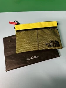 Neu mit Etikett! North Face X China Airlines Business Class Amenity Toilettentasche gelb - Bild 1 von 4