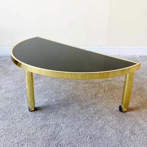 Hollywood Regency Gold Semicircular Coffee Table with Black Glass Top on Wheels Cover