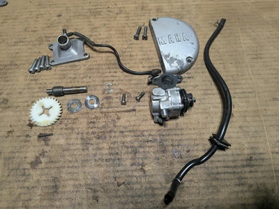 1979 YAMAHA GT80 OIL PUMP INJECTOR COVER HOSES MANIFOLD - Image 1 of 4