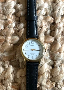 Timex Ladies Indiglo 25mm Gold Tone Backlit Dial Black Leather Strap Watch - Picture 1 of 6