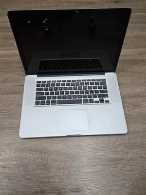 Apple 2010 Chrome MacBook Pro A1286  15.4" Laptop, FOR PARTS - Image 1 of 4