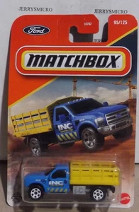 MATCHBOX FORD F-350 STAKE BED TRUCK IN BLUE/YELLOW #95/125 - Picture 1 of 1