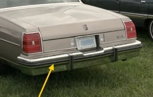 OEM 1980-1984 Olds 98 & 1980-1985 Oldsmobile Delta 88 Rear Bumper Impact Strip - Picture 1 of 14
