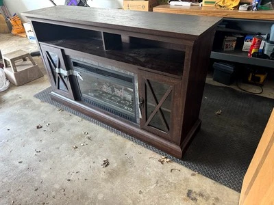 Soporte TV chimenea marrón oscuro con mando a distancia. Foto 1 de 3