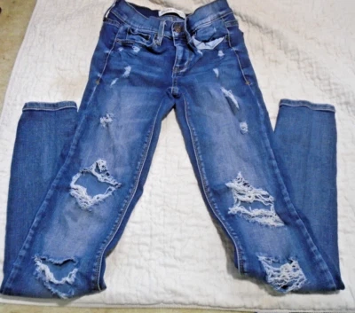 Pantalones de mezclilla Mudd FLX elásticos talla 0 tiro bajo ajustados azules desgastados 24x28 Foto 1 de 4