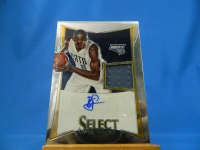 Bismack Biyombo Select 2012-13 RC Rookie Autograph Auto Jersey Materials /299 - Image 1 of 2