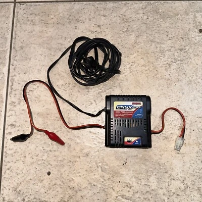 Duratrax Onyx 100 Ac/dc Peak Charger NiCd NiMH DTXP4190 RC Charger cord part - Image 1 of 4