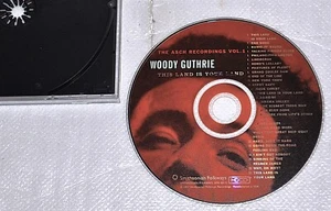 WOODY GUTHRIE THIS LAND IS YOUR LAND ASCH RECORDINGS #1 CD DISC NICE - Picture 1 of 1
