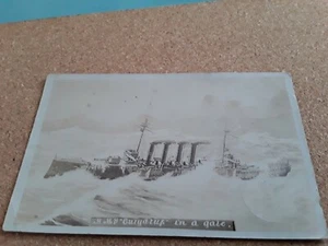 MILITARY POSTCARD HMS EURYALUS IN A GALE ROYAL NAVY CRUISER THAT FOUGHT IN WW1 - Picture 1 of 1