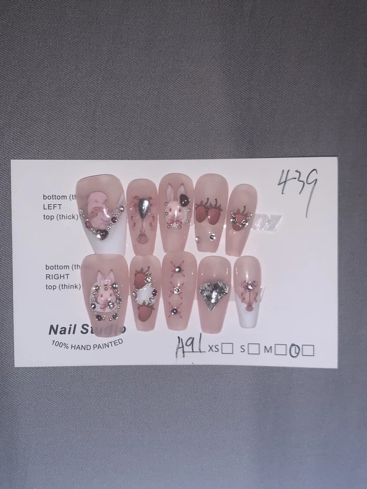 Wearing Fake Nails - Image 1 of 1