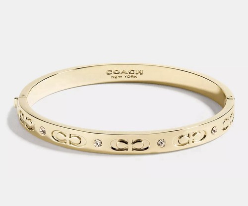 Bracciale Coach con cerniera ORO nuovo con scatola e cristalli F59083