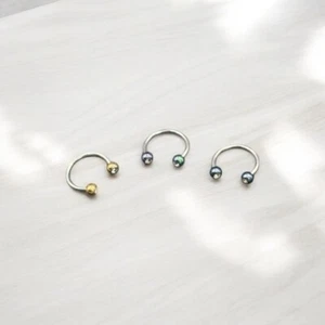 Set da 3 Piercing in Acciaio Chirurgico Bilanciere Circolare mm. 1,2x10 - Imagen 1 de 4