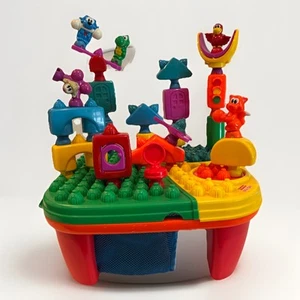 Fisher Price POP ONZ TABLE Musical POP’N TWIRL dreht 23 Bausteine LESEN - Bild 1 von 15