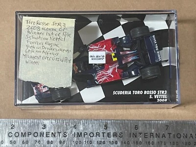 MiniChamps 1:43 Scuderia Toro Rosso STR3 Sebastian Vettel 2008 - Image 1 of 3