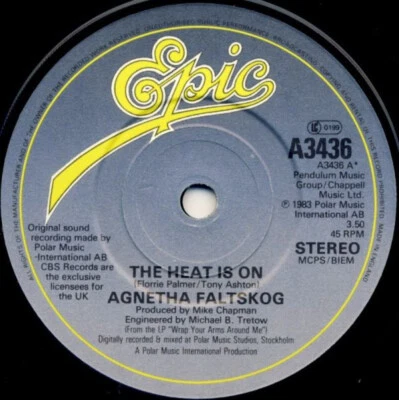 Agnetha Fältskog - The Heat Is On 7", Single, Pap Near Mint (NM or M-) Foto 1 de 2