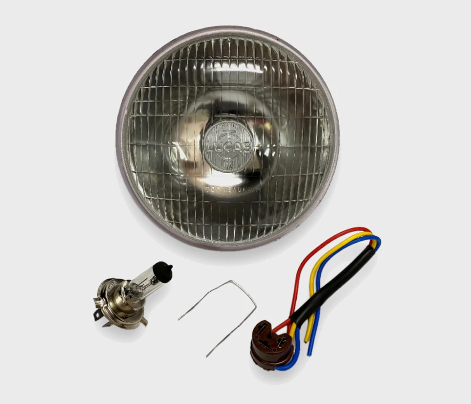 Lucas 700 7" pulgadas Lámpara de Cabeza Faro 12v Halógeno H4 Bombilla y Soporte Foto 1 de 3