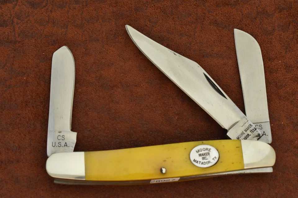 CUCHILLO DE GANADERO MOORE MATADOR TEXAS HECHO EN EE. UU. HUESO AMARILLO CARBONO (28927) Foto 1 de 4