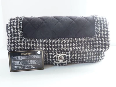 Bolso Chanel negro/blanco tweed y jersey/plateado herrajes con solapa mediana Foto 1 de 4