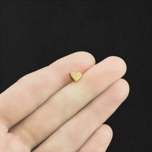 50 cuentas espaciadoras de corazón antiguo tono dorado detalles 3D - GC1181 - Imagen 1 de 5
