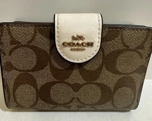 Cartera mediana con cremallera en esquina en lona exclusiva - Imagen 1 de 21