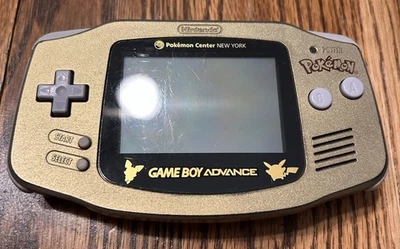 GameBoy Advance Pokemon Center New York Gold Edition Foto 1 de 4