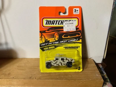 Matchbox 1993 MB 3 Hummer color is  desert camouflage with orange cross. - Image 1 of 4