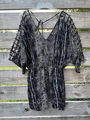 Mameluco con lazo trasero azul marino para mujer Foto 1 de 4