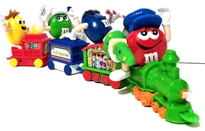 M&M's - Christmas Train Figurines - Set Of 4 - Series 1 - Red Yellow Green Blue - Picture 1 of 11